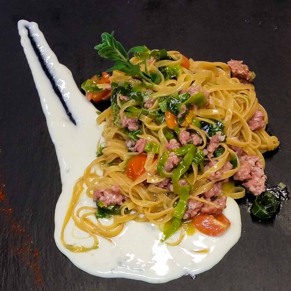 Beet Tagliolini with leek, sausage and blue cheese